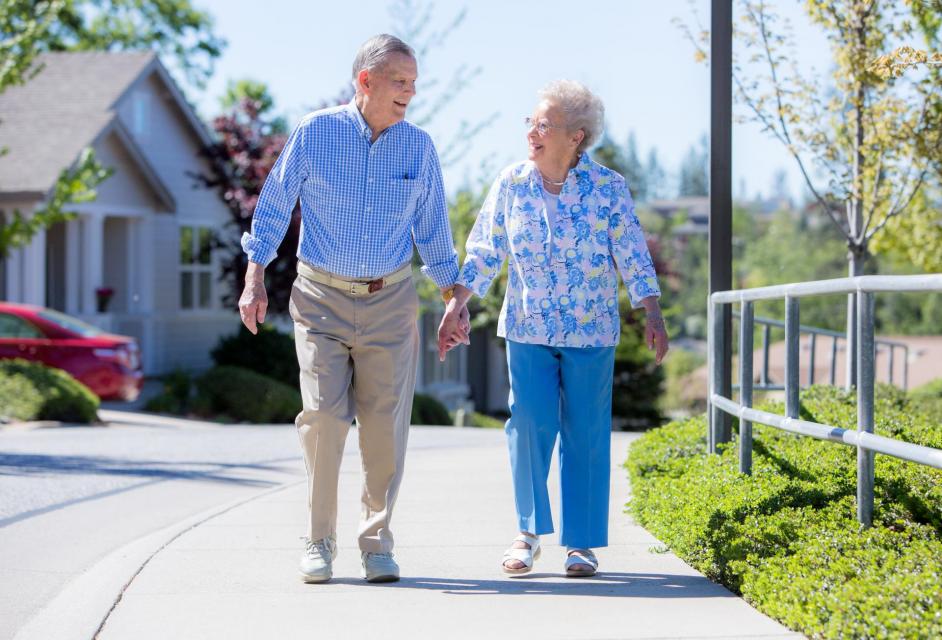 Residents couple walking the beautiful grounds at Eskaton Village Grass Valley.