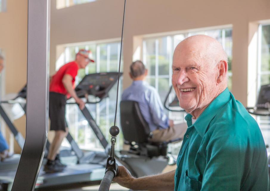 Residents working out in the community gym.