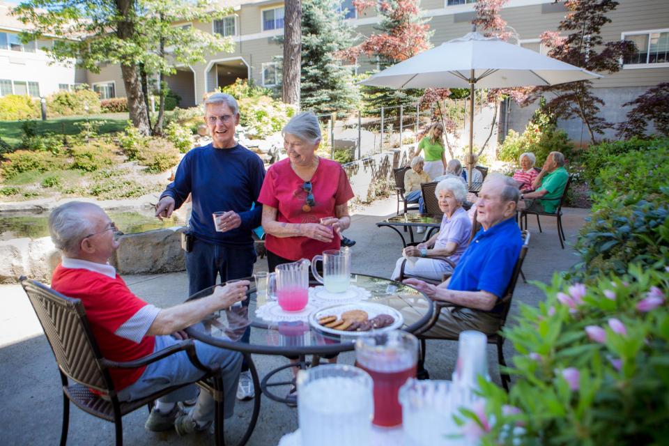 Residents socializing on the patio.