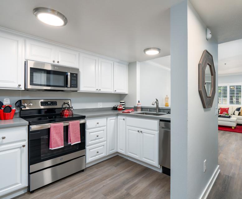 Apartment kitchen with red accents