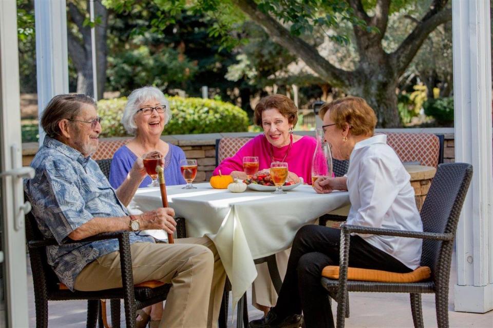 Friends having lunch on patio