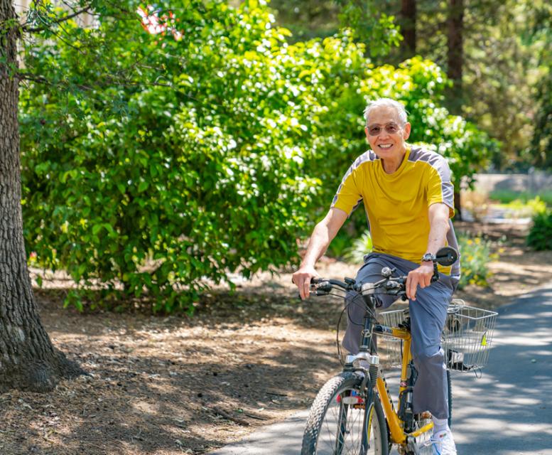 Resident riding his bike