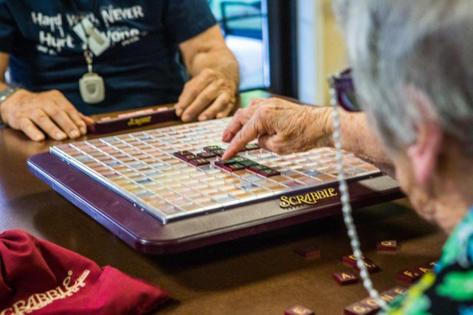 Residents playing Scrabble