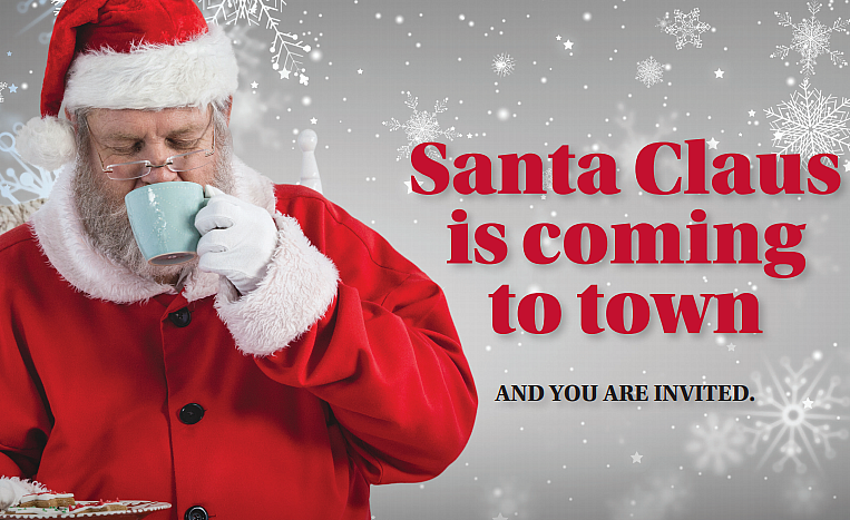 Santa siping coffee and holding a plate of cookies...He's coming to Eskaton Village Roseville